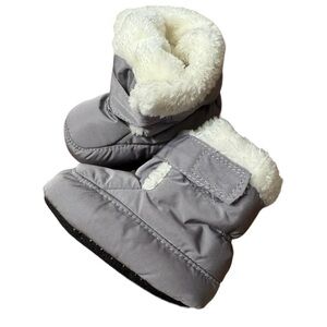 Baby soft slippers. Sole is 4 1/2 inches.